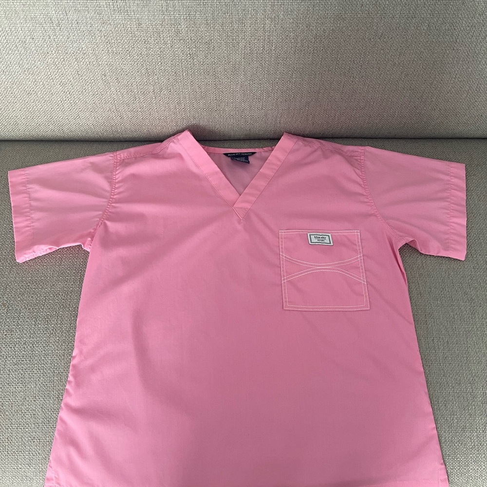 NWOT - Blue Sky Classic Shelby Scrub Top. Color: Pink Sorbet. Sz: M